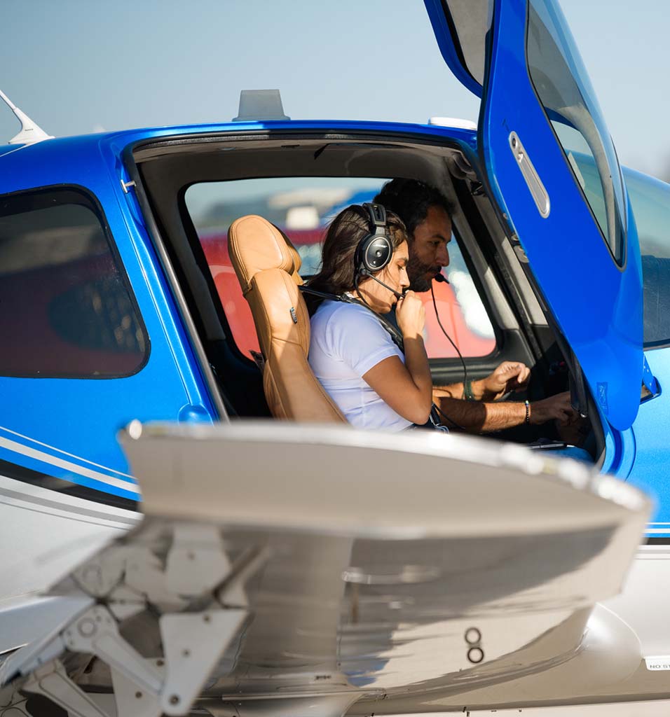 Student pilot reviewing pre-flight inspection with instructor at CalAir Aviation — Los Angeles flight school and Cirrus Platinum Certified Training Center